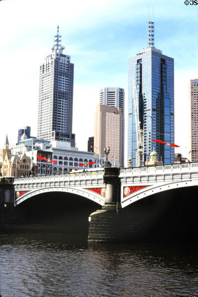 Princess Bridge in front of skyscrapers in Melbourne. Melbourne, Australia.