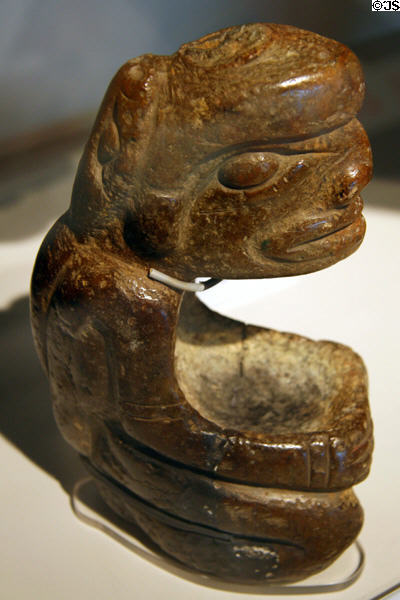 Skytte bowl of kneeling human figure with bowl & serpent at Vancouver Museum. Vancouver, BC.