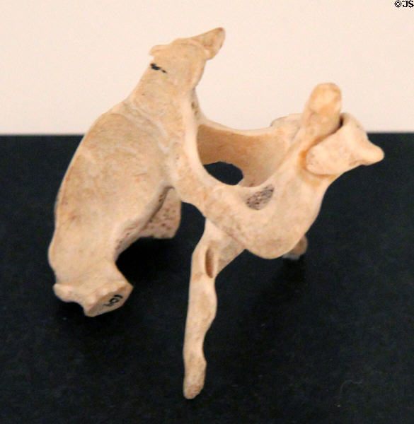 Inuit bone carving representing fighting man & bear (c1971) by Palosee? of Arctic Bay, Nunavut at National Gallery of Canada. Ottawa, ON.