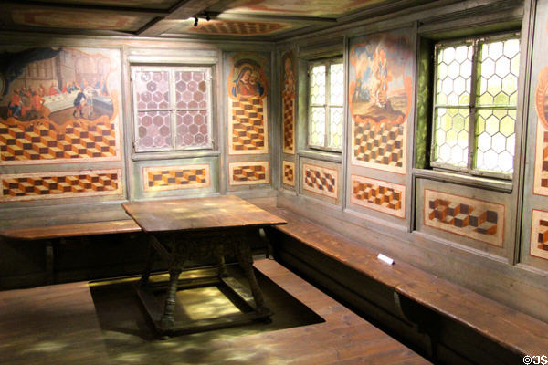 Room with painted panel of last supper, biblical scenes & cube illusions (c1770s) from Tirol at Bavarian National Museum. Munich, Germany.