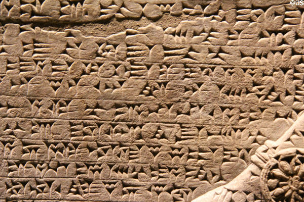 Cuneiform detail of Assyrian two winged genie (c870 BCE) from Nimrud NW Palace of Kings at Museum Ägyptischer Kunst. Munich, Germany.