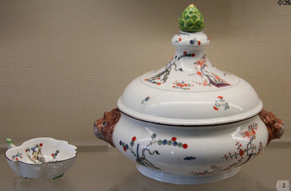 Meissen porcelain lidded terrine with lion head handles & yellow tiger pattern (c1745-50) beside bowl in yellow tiger (aka Gelber Löwe) pattern after Japanese style at Meissen porcelain museum at Lustheim Palace. Munich, Germany.