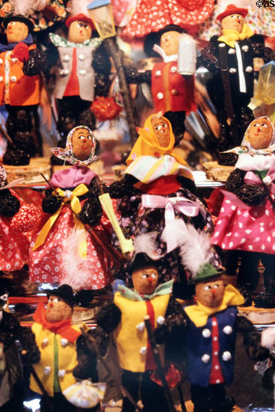 Christmas ornament figurines made from prunes (Zwetschgenmännla) at Christmas Market on Frauen Kirche square. Nuremberg, Germany.