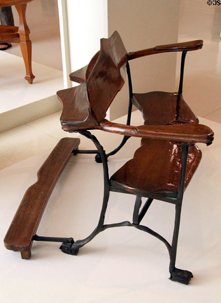 Modernista prayer bench (1914) from Casa Güell chapel in Barcelona by Antoni Gaudí at Museu Nacional d'Art de Catalunya. Barcelona, Spain.