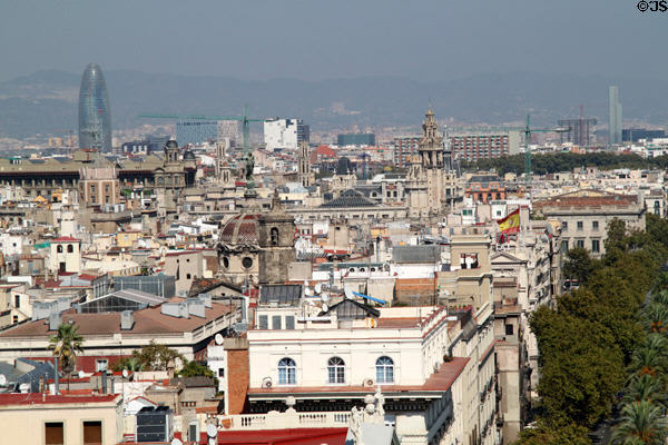 Towers & spires rise from Barcelona skyline. Barcelona, Spain.