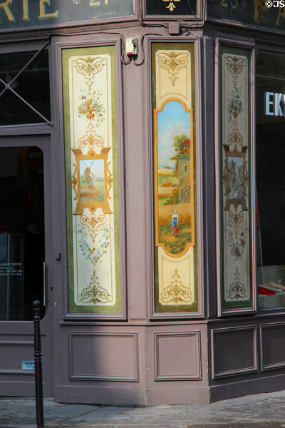 Bakery shop sign painting showing harvesting & milling of wheat. Paris, France.