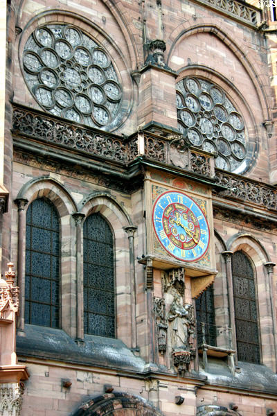 Clock & rose windows of south side of Cathedral. Strasbourg, France.