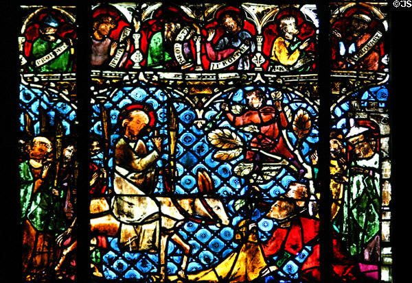 Stained glass entry of Christ into Jerusalem in Cathedral. Strasbourg, France.