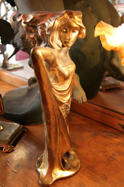 Statuette of woman at Maxim's Art Nouveau Collection 1900. Paris, France.
