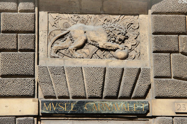 Lion carving by Goujon next to entrance at Carnavalet Museum. Paris, France.
