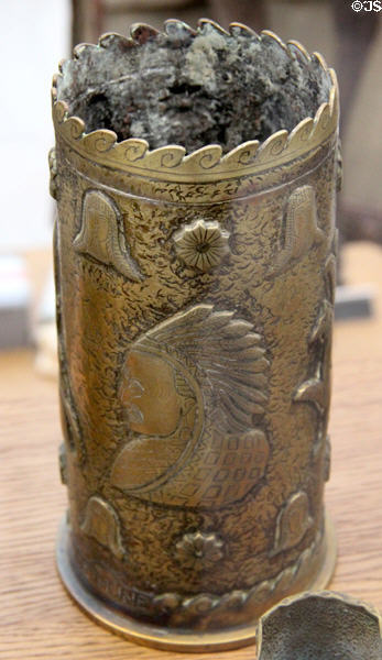 Decorated metal container made by WWI frontline soldier from battlefield rubble shell casing at Armistice Rail Car Museum. Compiègne, France.