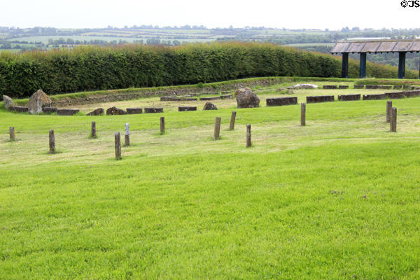 New wood poles & boulders mark ancient henges at Newgrange. Ireland.