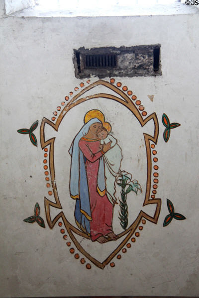 Main hall cell interior with Madonna & Child painted (1923) by prisoner Mrs. Joseph Plunkett at Kilmainham Gaol. Dublin, Ireland.