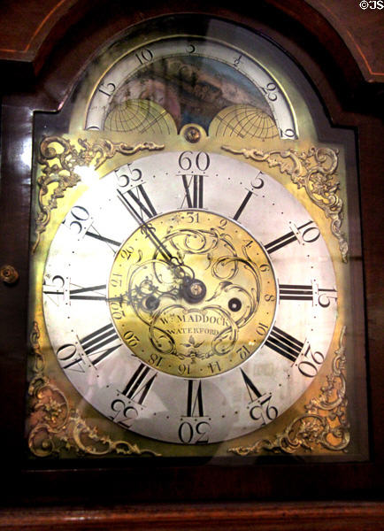 Face of tall clock (c1780) by William Maddock of Waterford at Bishop's Palace. Waterford, Ireland.