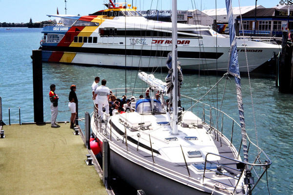 Sailing ships & yachts docked at Ferry building. Auckland, New Zealand.