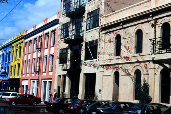 Manners Street restoration with painted facades has lured active street life. Wellington, New Zealand.