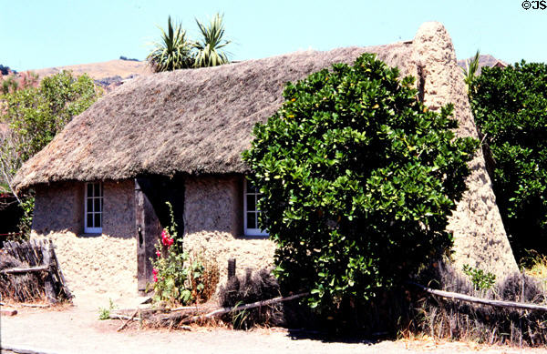 Early settlers thatch & mud cottage reconstructed at Ferrymead Heritage Park, Christchurch (Ch Ch). New Zealand.