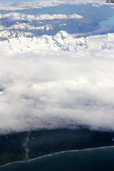 Mount Cook seen from air hidden behind clouds. New Zealand.