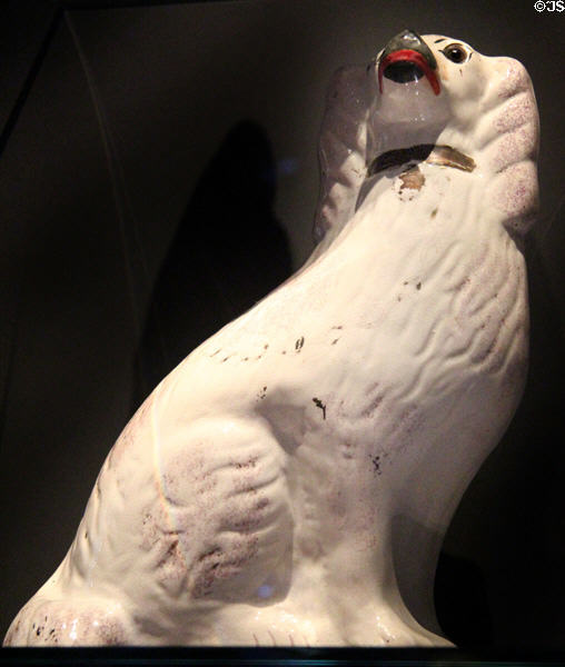 Earthenware spaniel dog figures (late 19thC) possibly from Staffordshire, England at National Museum of Scotland. Edinburgh, Scotland.