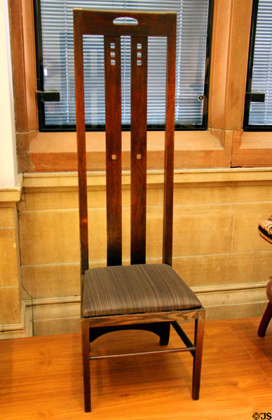 Ingram Street Tearoom oak chair (1900) by Charles Rennie Mackintosh at Kelvingrove Art Gallery. Glasgow, Scotland.