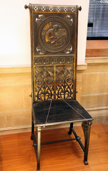 Cast iron & oak chair (c1870) by Christopher Dresser for Coalbrookdale of Shropshire at Kelvingrove Art Gallery. Glasgow, Scotland.
