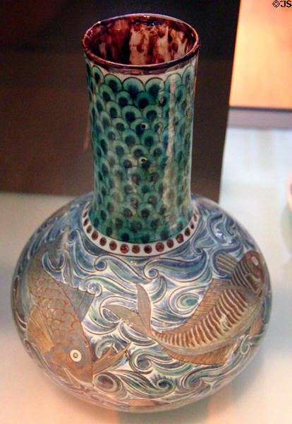 Earthenware Arts & Crafts vase with fish & scale decoration (1882-8) by William de Morgan of Merton Abbey workshop, Surrey, England at Kelvingrove Art Gallery. Glasgow, Scotland.