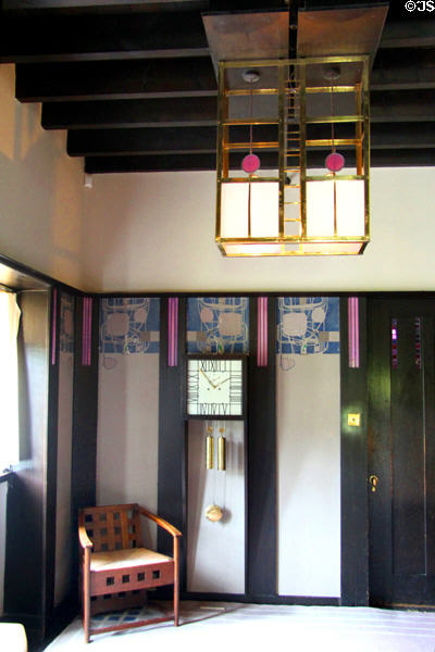 Hallway lamp, clock & decorated panels at Hill House. Helensburgh, Scotland.