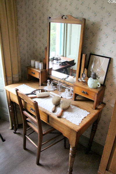 Bedroom dressing table with mirror at Tenement House museum. Glasgow, Scotland.