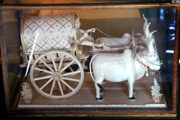 Carved water buffalo cart from India in Large Library at Hopetoun House. Queensferry, Scotland.