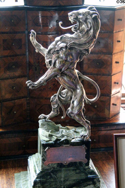 Silver Scottish lion on jade presentation sculpture in dining room at Glamis Castle. Angus, Scotland.