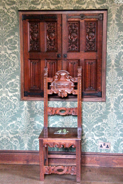 Carved sidechair & window shutters at Falkland Palace. Falkland, Scotland.