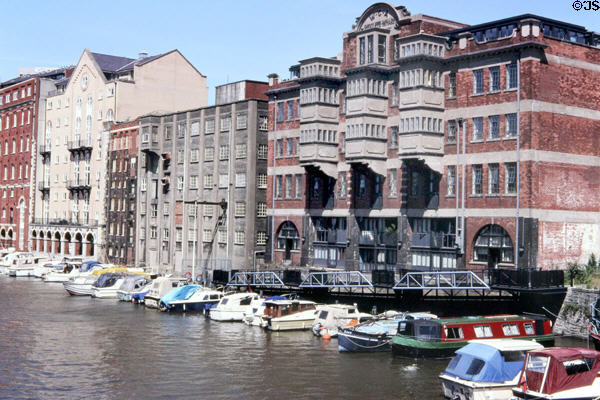 Pleasure boats docked at former warehouses lining Floating Harbour (mid-1990's). Bristol, England.
