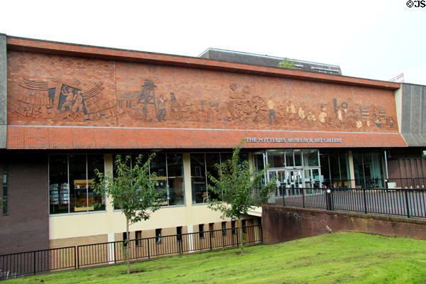 Tile mural depicting Stoke-upon-Trent historic industries on Potteries Museum & Art Gallery building. Hanley, Stoke-on-Trent, England.