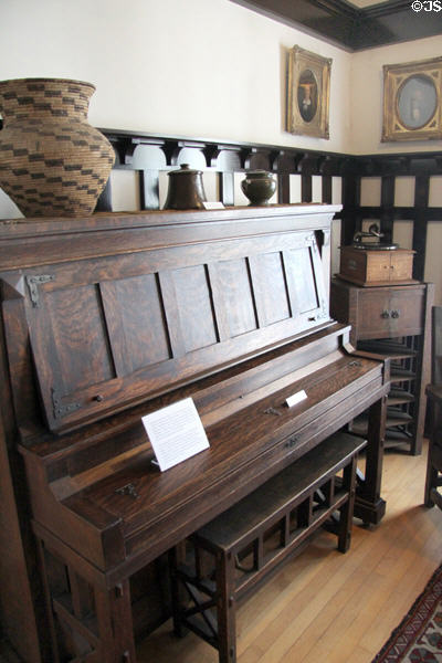 Arts & Crafts piano & bench (1900-1930) by J.M. Young Co. of Camden, NJ over Emerson Piano in Corbett House at Tucson Museum of Art. Tucson, AZ.