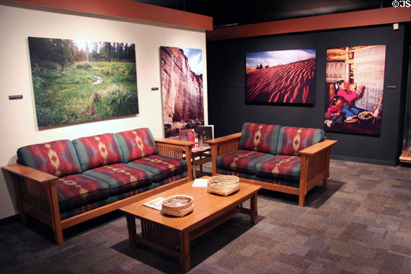 Seating area with mission style furniture & photo murals at Arizona State Museum. Tucson, AZ.