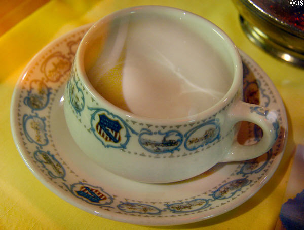 Union Pacific Railroad Historical Overland pattern coffee cup (1927-50s) showing events in American Westward expansion at California State Railroad Museum. Sacramento, CA.