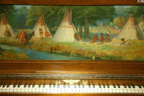 Painted detail of Native American tepees on Steinway upright piano at Autry National Center. Los Angeles, CA.