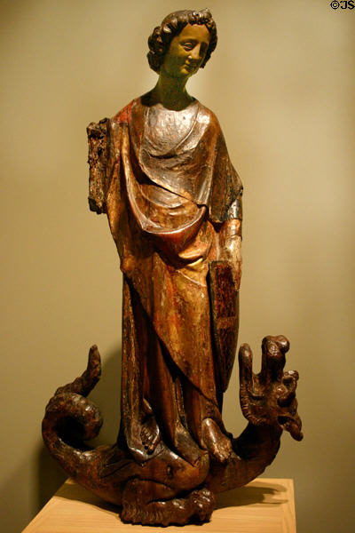 St Michael & the Dragon (13thC) by School of Reims of polychromed oak in Norton Simon Museum. Pasadena, CA.