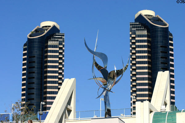 Harbor Club towers with Flame of Friendship sculpture by Leonardo Nierman at Convention Center. San Diego, CA.