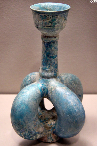 Earthenware fritware vase with four lobes (1100-1300) from Iran at Asian Art Museum. San Francisco, CA.