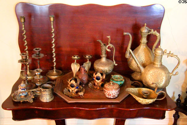 Card table with collection of metal objects at Pardee Home Museum. Oakland, CA.