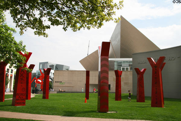 Wheel (2004) by Edgar Heap of Birds inscribed "Nah Kev Ho Eya Zim" inspired by native medicine wheel at Denver Art Museum. Denver, CO.