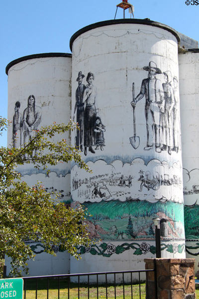 Western settlers mural on Antonito water towers. Antonito, CO.