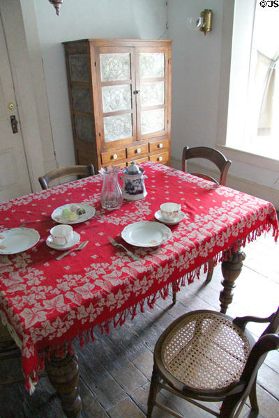 Dining table with pie safe at Baca Adobe House. Trinidad, CO.