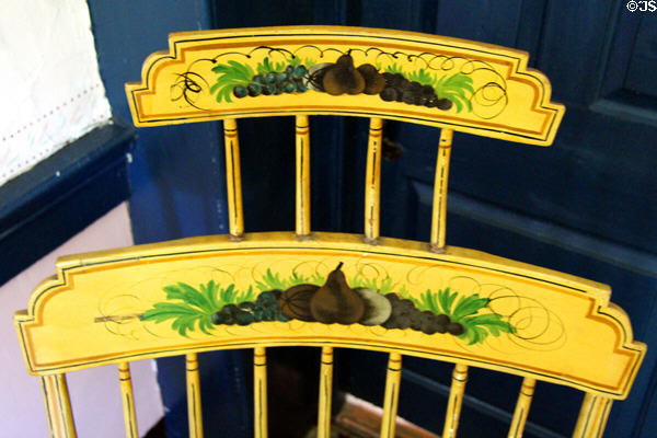 Rocking chair with headrest & painted decoration at Thomas Griswold House. Guilford, CT.
