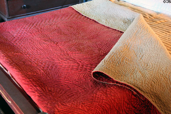 Calamanco quilt (18thC) with glazed surface at Henry Whitfield State Museum. Guilford, CT.