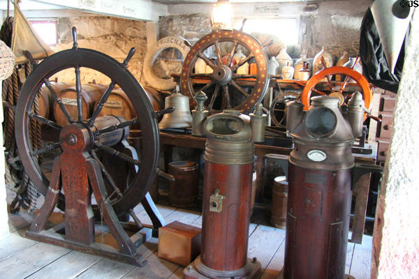 Ships wheels & compasses in chandlery at Mystic Seaport. Mystic, CT.