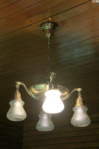 Lamp with one bulb burning as featured in Eugene O'Neill's biographical "Long Days Journey into Night" at Monte Cristo Cottage. New London, CT.