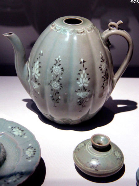 Korean stoneware ewer with design of lotus & chrysanthemum sprays (late 12th-mid 13thC) at Smithsonian Freer Gallery of Art. Washington, DC.