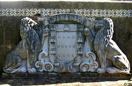 Stone coat of arms with lions in garden of The Oldest House. St Augustine, FL.